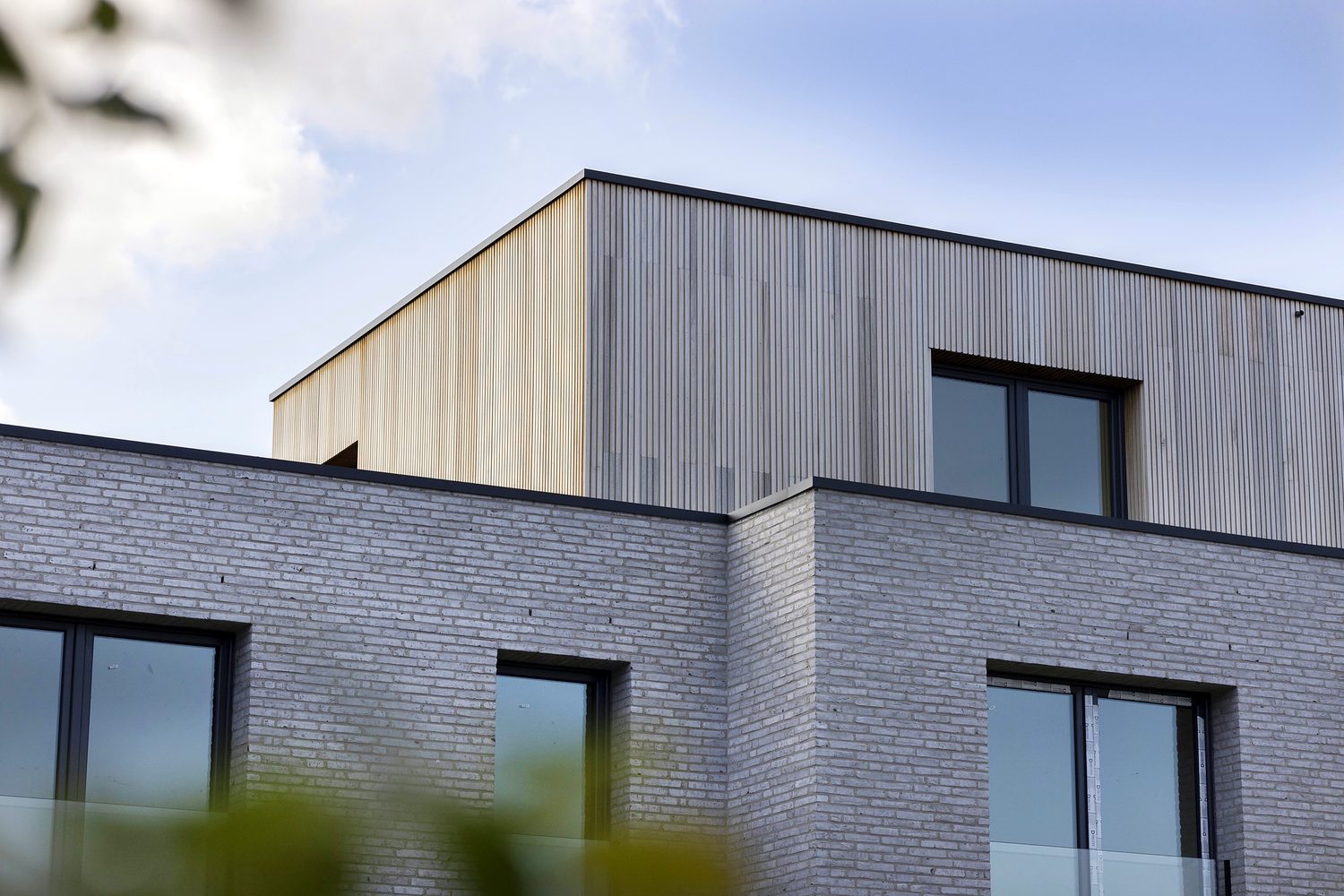 Bovenverdieping met houten gevelbekleding
